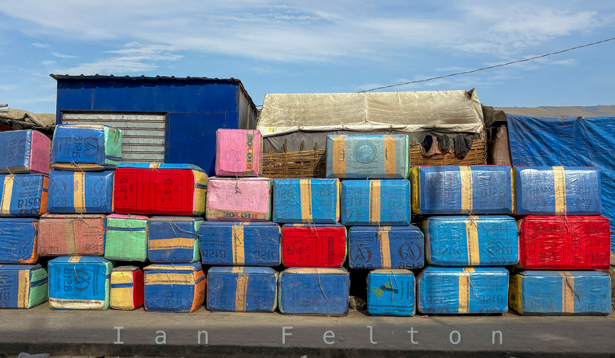 Ice boxes ready to store fish line the street